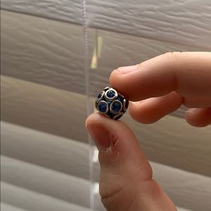 Blue glass pandora charm